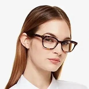 girl-wearing-brown-rimmed-kate-spade-eyeglasses