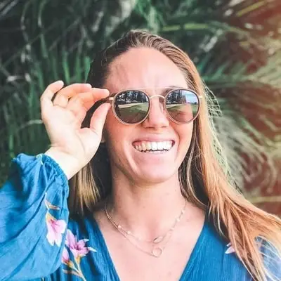 happy-blond-woman-wearing-maui-jims