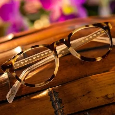 pair-of-maui-jim-eyeglasses-on-wood